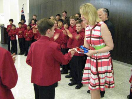 4.	The Australian Boys Choir presents a token of appreciation to Australian Deputy High Commissioner, Mrs Jane Duke.